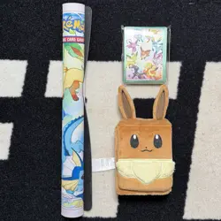 Pokemon Prismatic Evolution Super-Premium Collection Mat, Sleeves & Eveee Pouch - Image 1