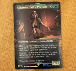 Cleopatra, Exiled Pharaoh, M 0119 NM Foil Borderless Assassin’s Creed Non-Serial - Image 1
