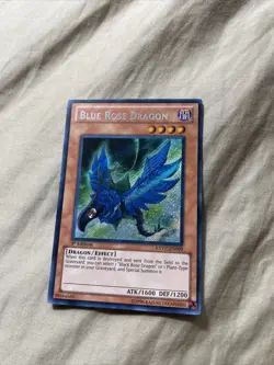 Blue Rose Dragon (EXVC-EN099) 1st Edition - Secret Rare - LP-NM - Image 1