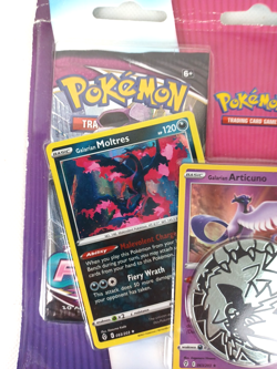Pokemon TCG: Moltres Articuno Zapdos Cards with 2 Booster Packs & Coin - Image 2
