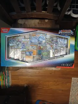 POKEMON PRISMATIC EVOLUTIONS LUCARIO $ TYRANITAR PREMIUM COLLECTION - Image 1