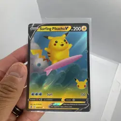 2021 Pokemon SWSH Celebrations Surfing Pikachu V #008/025 - Image 1