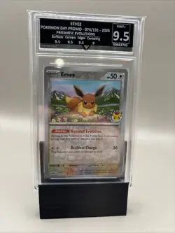 Eevee - Pokemon Day Stamp - 074/131 Prismatic Evolutions - Get Graded 9.5 Slab - Image 1