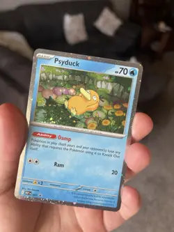 Pokemon TCG Psyduck MEP 007 Mega Evolutions Cosmos Holo Black Star Promo NM - Image 1