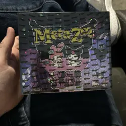 MetaZoo Hello Kitty Trading Card Game Kuromi's Cryptid Carnival Booster Box - Image 1