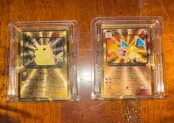 Pokemon Celebrations Gold Charizard & Pikachu (metal never taken out of plastic) - Image 1