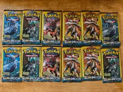 Pokemon Sun & Moon Base Set 3 Card Mini Booster Packs Lot of 12 FACTORY SEALED - Image 1