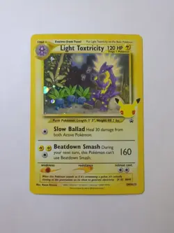 Light Toxtricity SWSH137 Promo NM | Pokemon Celebrations 25 - Image 1