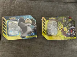 Pokemon Lucario & Melmetal and Garchomp & Giratina Tag Team GX SEALED Tins - Image 1