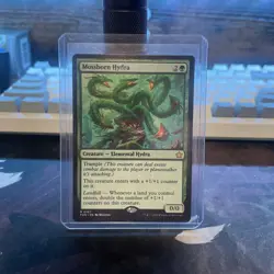 Mossborn Hydra MTG Foundations 107 Rare NM - Image 1