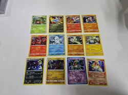 Lot Of 12 Cracked Ice Holo Pokemon Cards - Image 1