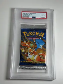 PSA 8 Pokemon TCG Base Set Unlimited Booster Pack Charizard Artwork WOTC 1999 - Image 1