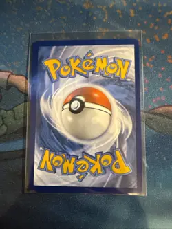 Team Rocket's Mimikyu 087/182 Destined Rivals Prerelease Stamped Cosmos Holo - Image 2