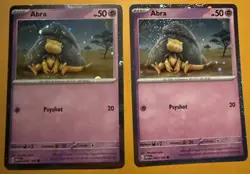 Pokemon Tcg 151 Abra Promos Both Variants Cosmo Hd And Pixel Foil With Swirls - Image 1