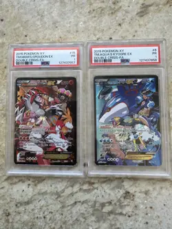 2015 Pokemon XY Double Crisis PSA 1 Team Magma's Groudon & Team Aqua Kyogre - Image 1