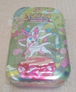 Pokemon TCG: Scarlet & Violet Prismatic Evolutions Mini Tin Sylveon - Image 1