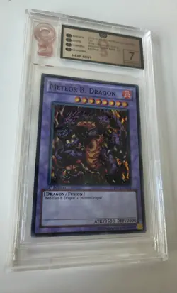 Meteor B. Dragon PRC1-EN004 Super Rare 1st Edition Light Play Yugioh Graded OG 7 - Image 1