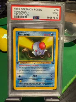 PSA 9 MINT 1999 POKEMON FOSSIL 56 TENTACOOL 1ST EDITION ENGLISH - Image 1