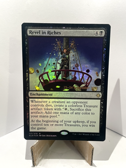 Revel in Riches (FOIL) - Ixalan - Prerelease Promo - Rare - 117/279 - Image 1