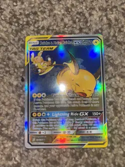 Pokemon TCG Holo Ultra Rare Raichu and Alolan Raichu GX Tag Team FAKE/REPLICA - Image 1