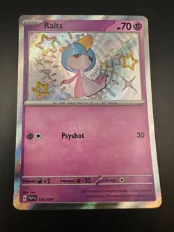 Pokemon Card TCG - Ralts 153/091 - Paldean Fates - Baby Shiny Rare - Image 1