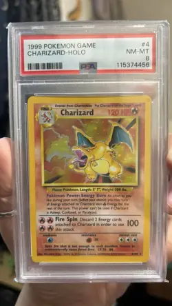 1999 POKEMON BASE SET UNLIMITED #4 CHARIZARD-HOLO PSA 8 - Image 1