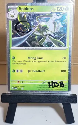 Pokemon Spidops SVP 009 Scarlet Violet Cosmos Holo Black Star Promo HD Swirl HDB - Image 1