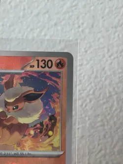 2025 POKEMON PRE EN-PRISMATIC EVOLUTIONS MASTER BALL REVERSE HOLO FLAREON NM - Image 3