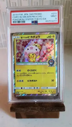 2018 Pokemon SM-P Promos (JP) Cherry Blossom Afro Pikachu #211/SM-P - Image 1