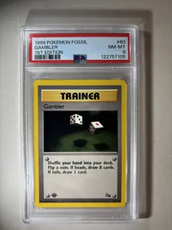 1999 POKEMON FOSSIL 1ST EDITION #60 GAMBLER PSA 8 Vintage! - Image 1