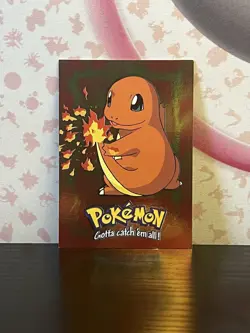 Pokemon The First Movie Charmander E4 of 12 Textured Holo Topps 1999 LP - Image 1