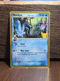 Pokemon Card TCG - Mimikyu Delta Species SWSH136 Promo Celebrations Near Mint - Image 1