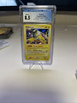 2007 Pokemon, D&P Secret Wonders #16/132 Raikou, Cracked Ice Holo Graded KSA 8.5 - Image 1