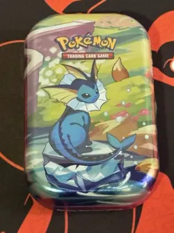 Pokemon TCG Scarlet & Violet PRISMATIC EVOLUTIONS VAPOREON Mini Tin NEW & SEALED - Image 1