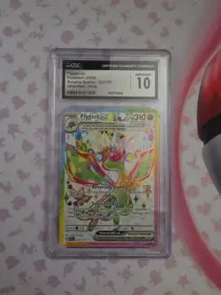 Pokemon TCG Surging Sparks Flygon Ultra Rare 222/191 CGC Gem Mint 10 - Image 1