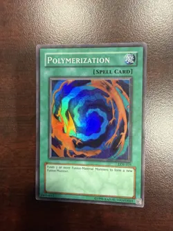 Polymerization YuGiOh! LOB-059 Super Rare Unlim. Original Print HP/MP (creased) - Image 1