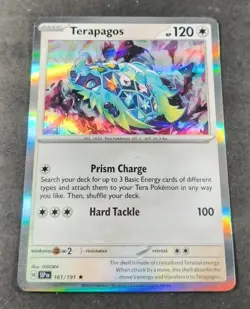 Pokemon Surging Sparks Terapagos Holo Rare Card 161/191 NM - Image 1