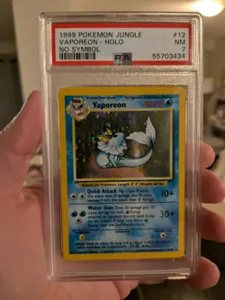Vaporeon 12/64 Holo Jungle Error Misprint No Symbol Rare Pokemon Card PSA 7 - Image 1