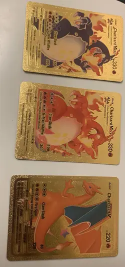 Pokemon TCG 2020 Nintendo/creatures/Gamefreak Gold Foil Charizard 3 Card Bundle - Image 1