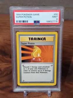 1999 POKEMON BASE SET UNLIMITED #90 SUPER POTION PSA 9 - Image 1