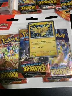 Pokemon: Surging Sparks (2) 3-pack Blister & Booster Bundle. New Sealed - Image 4