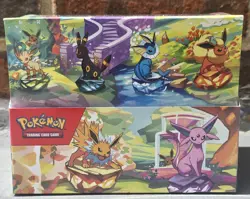 Pokemon Prismatic Evolutions Mini Tin Display Box 8 Tins Individually Sealed - Image 1