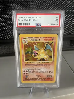 1999 POKEMON BASE SET UNLIMITED #4 CHARIZARD-HOLO PSA 7 - Image 1