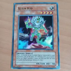 Alien Kid CRMS-EN084 Super Rare Yu-Gi-Oh - Image 1