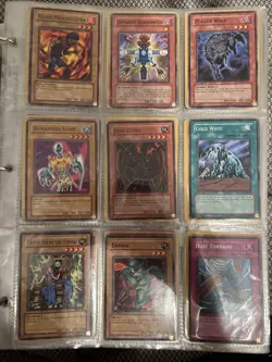 White binder full of Pokemon, Yu-Gi-Oh, and WotC cards. - Image 2
