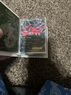 mini pokemon binder filled with some rare cards and some regular cards - Image 4