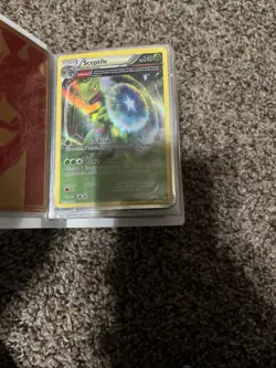 mini pokemon binder filled with some rare cards and some regular cards - Image 5