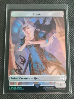 Hero (0009) Treasure (0023) Double-Sided Token - Foil - MTG Final Fantasy FIN - Image 1