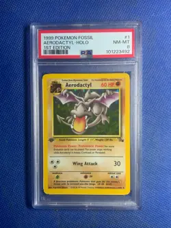 1999 Pokemon Fossil Aerodactyl Holo 1st Edition PSA 8 - Image 1