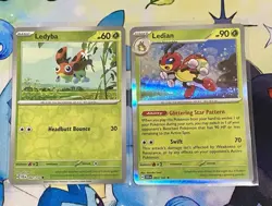 Pokemon Stellar Crown Ledian 003/142 Holo Rare + Ledyba 002/142 Reverse Holo NM - Image 1